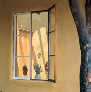 Light washes across the truth window in the sunny breakfast room.